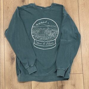 Woman’s Green Graphic Sweater from Coeur d’Alene